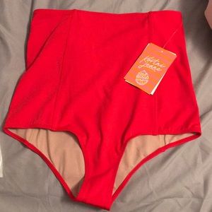 Kortni Jeane extended high waisted red bottoms.